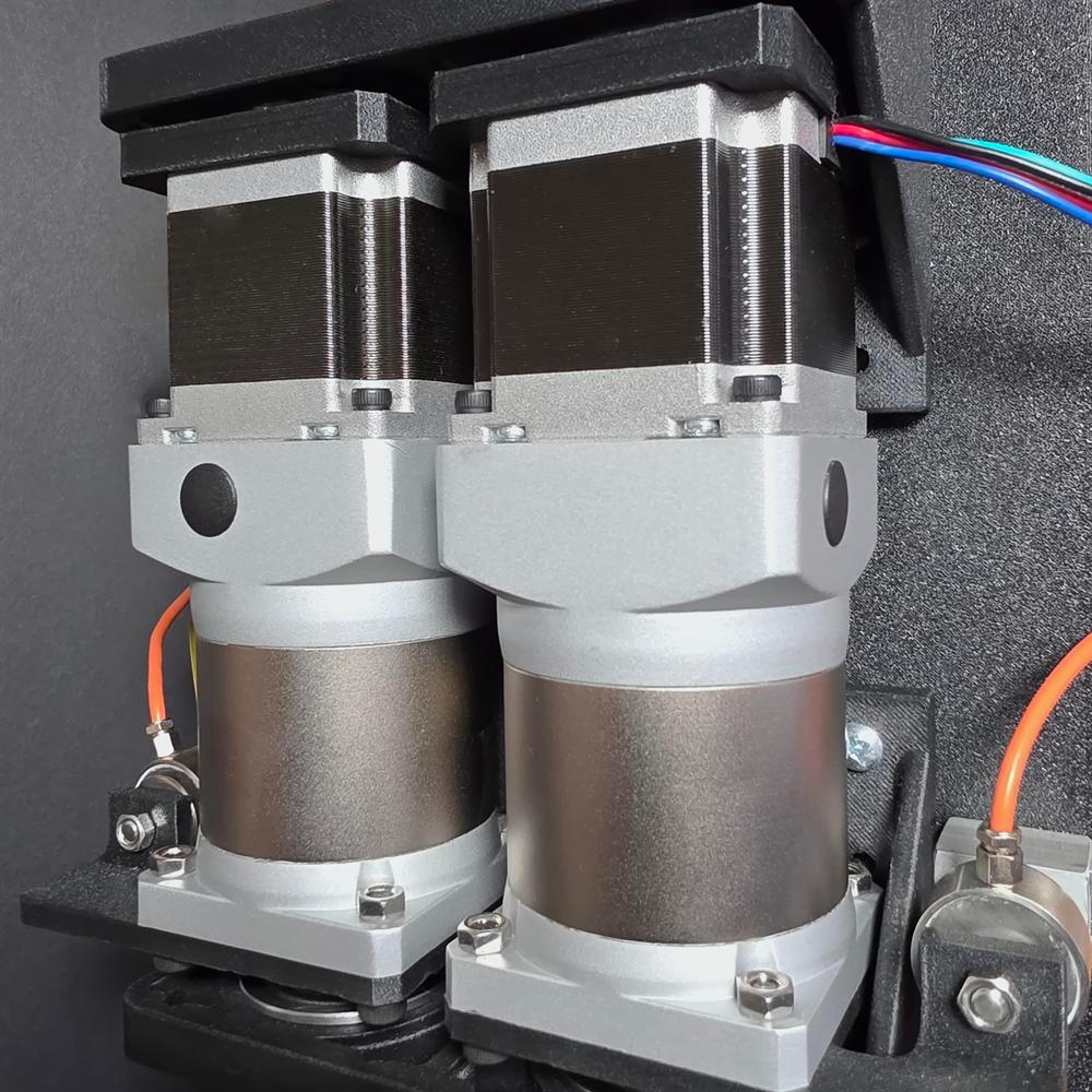 Untitled Closeup of a pair of geared stepper motors